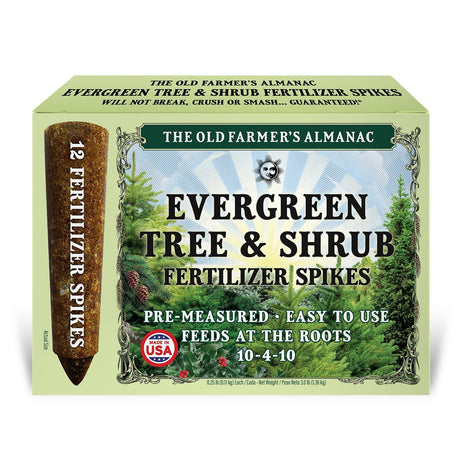 A box of Evergreen Tree & Shrub Fertilizer Spikes by The Old Farmer's Almanac, featuring a light green background with forest imagery and a single depicted fertilizer spike on the left side.