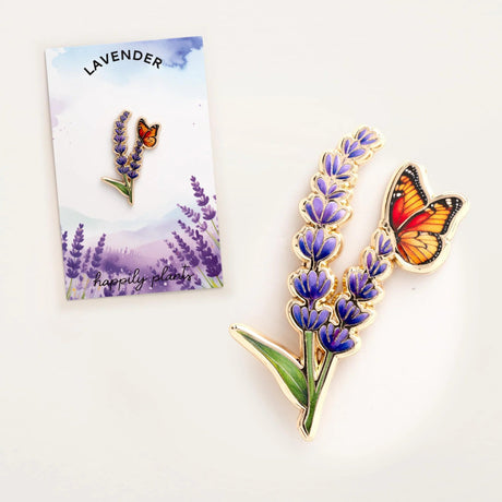 Lavender and butterfly enamel pin with packaging on a white background