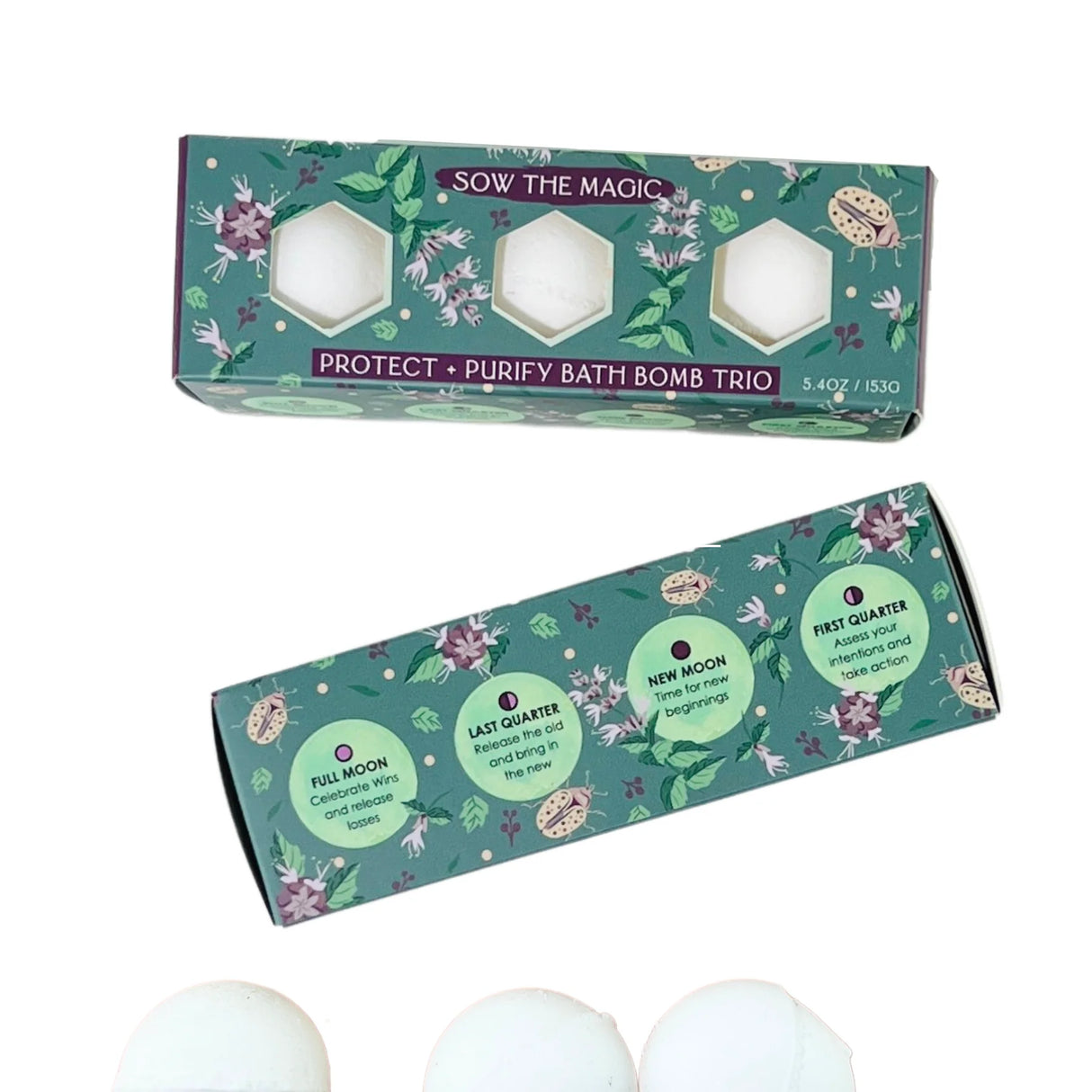 Bath bomb trio packaging with floral designs and product names on a white background