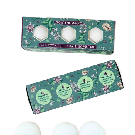 Bath bomb trio packaging with floral designs and product names on a white background