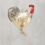 Decorative glass rooster ornament on a plain background