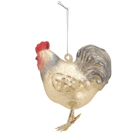 Decorative rooster ornament with a red comb on a white background