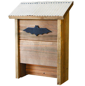 The rustic farmhouse bat house with rustic wood construction, corrogated metal roof, and black bat emblem