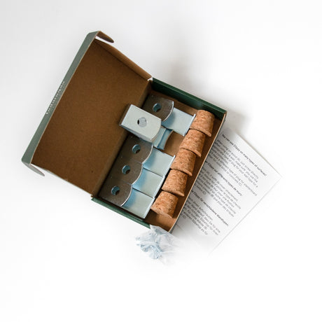 The contents of the Clippy box, includes Cork stoppers with metal clips and screws to hang planters from your wall.