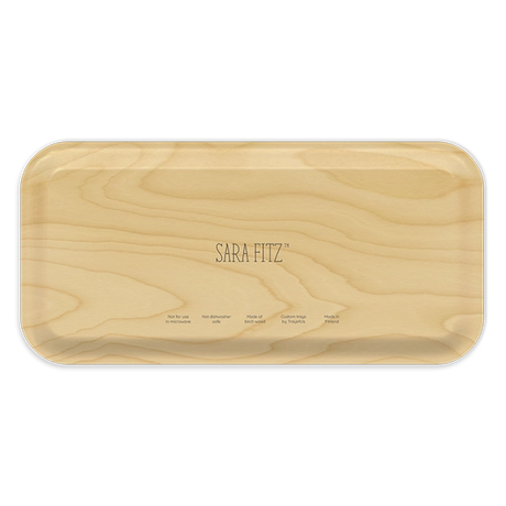 Wooden cutting board with 'Sara Fitz' branding on a white background