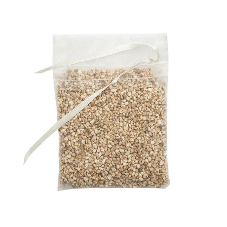 the scent away pouch, which looks like a mesh tea bag filled with beige gravelly material