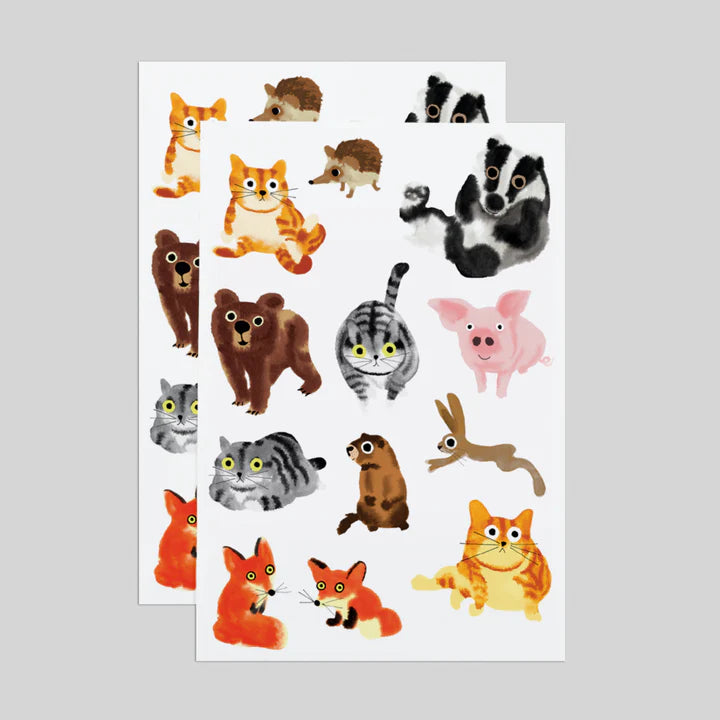 Sheet of animal tattoos with various illustrated animals on a white background