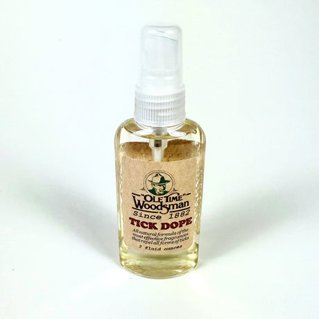 Bottle of 'Tick Dope' by Ole Time Woodsman on a white background