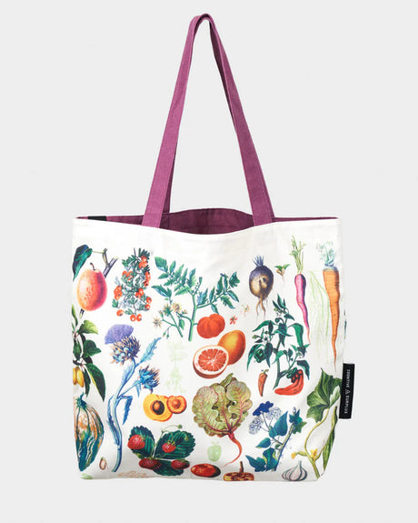 side two  of the farmer's market tote; a white tote bag with lavender straps covered in vintage illustrations of fruits and veggies