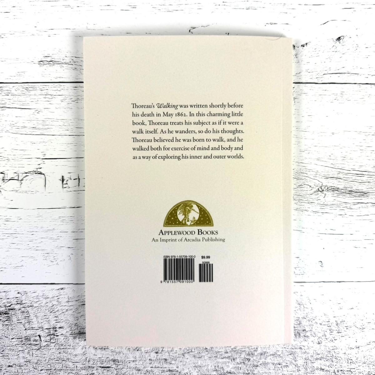 Back cover of a book by Applewood Books on a wooden surface