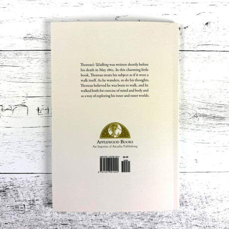 Back cover of a book by Applewood Books on a wooden surface