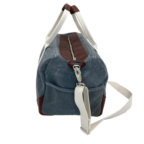 a side view of the waxed briquette weekender bag
