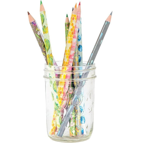 Colorful pencils in a glass jar on a white background
