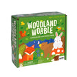 Box of 'Woodland Wobble' wildlife stacking game with forest animals on a green background