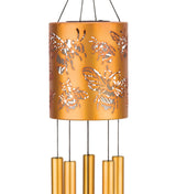 close up view of the chime cylinder with bee engravings and chimes hanging below