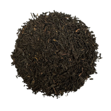 a pile of Colonial Bohea loose tea on a white background