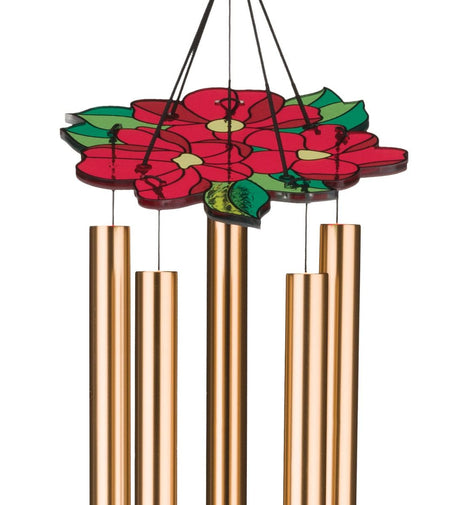 closeup of the red floral canopy of the cardinal chimes showing chimes hanging below