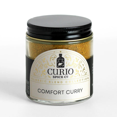 a jar of the comfort curry spice against a white background