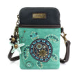 a faux leather crossbody bag with turquoise color and sea turtle design