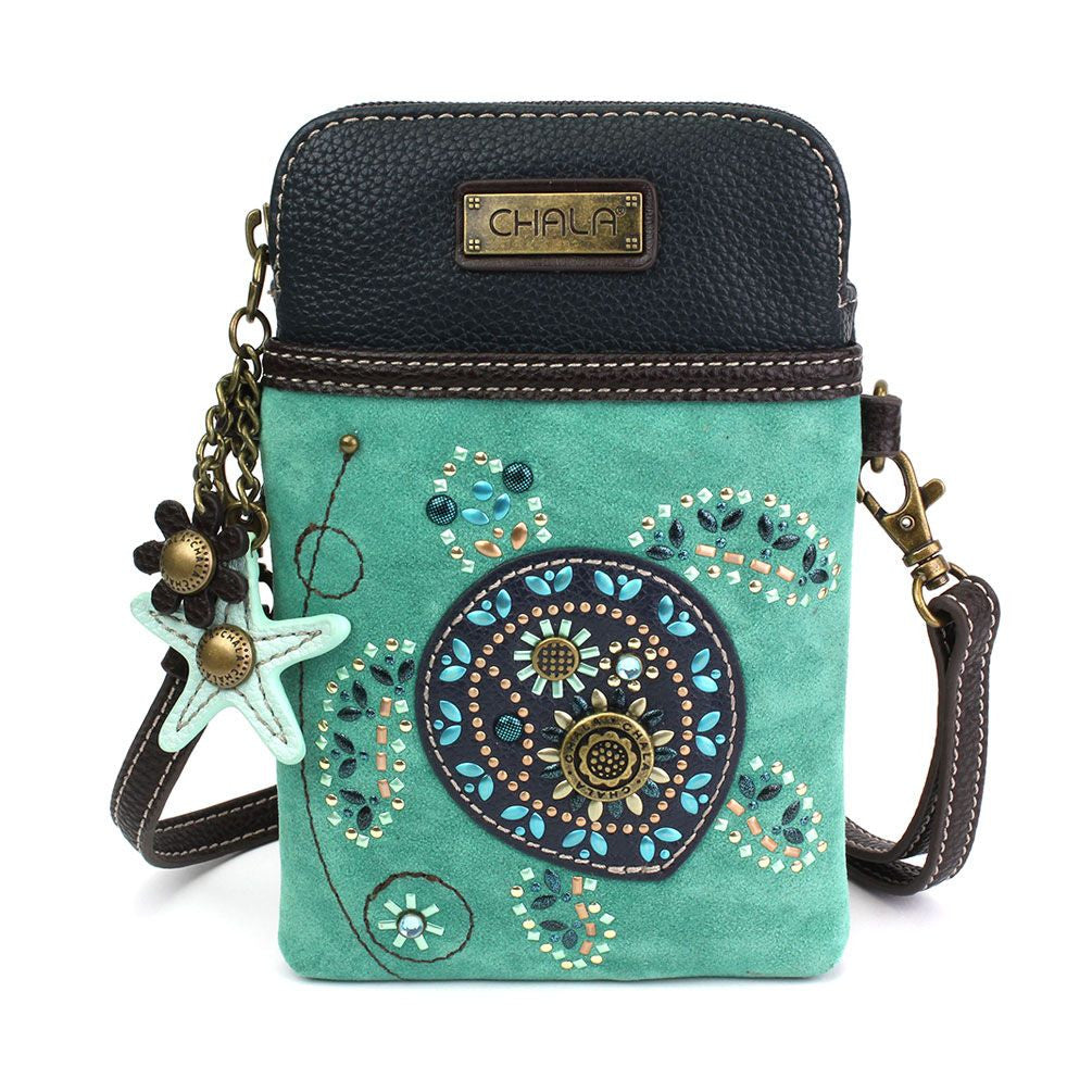 a faux leather crossbody bag with turquoise color and sea turtle design