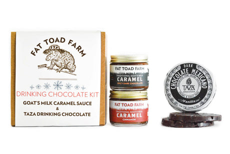 the drinking chocolate kit box with frog graphic next to the two jars of caramel and the disk of chocolate