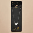close up of the gold chain that goes with the half moon silver necklace