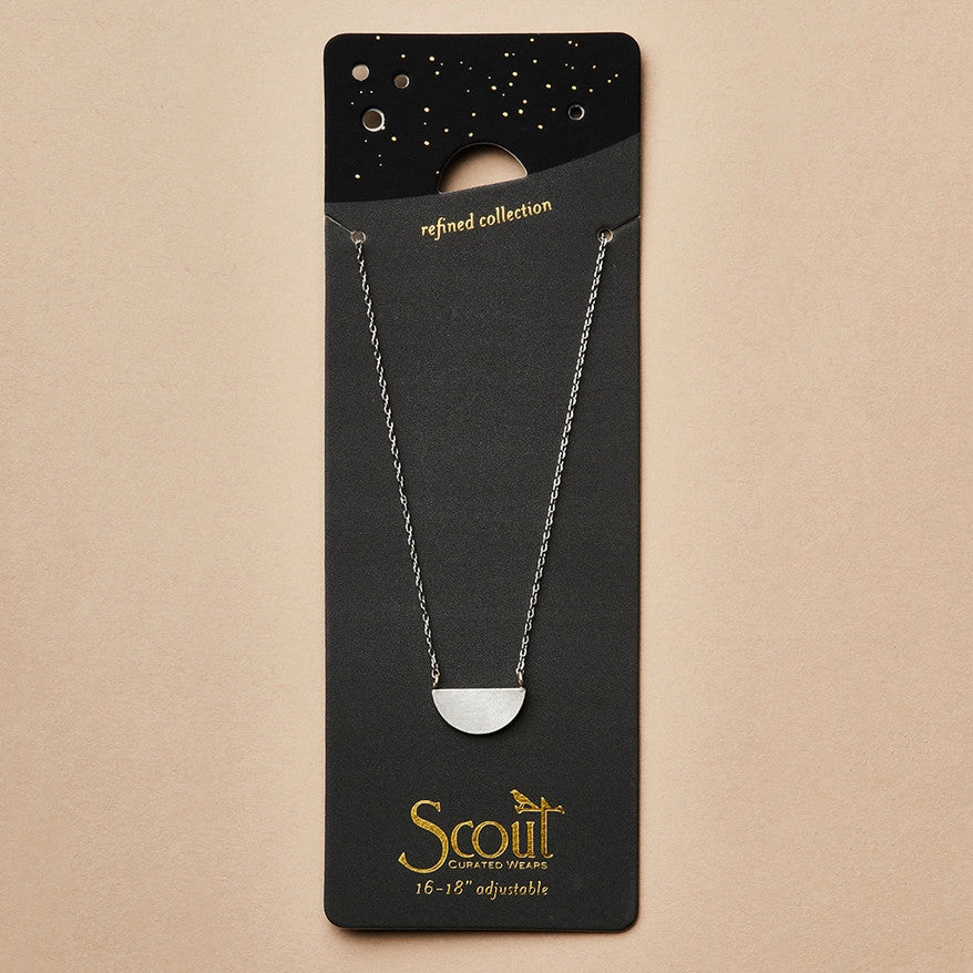 close up of the gold chain that goes with the half moon silver necklace