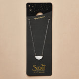 close up of the gold chain that goes with the half moon silver necklace