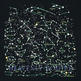 close up of the front of the tee design featuring constellations and "Heavenly Bodies' text