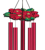 closeup of the red floral canopy of the hummingbird chimes showing chimes hanging below