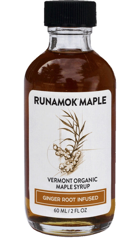 a bottle of the ginger infused maple syrup from the pantry favorites collection against a white background