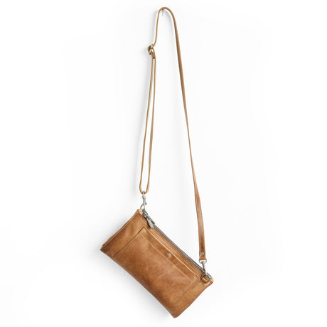 Brown leather crossbody bag on a white background
