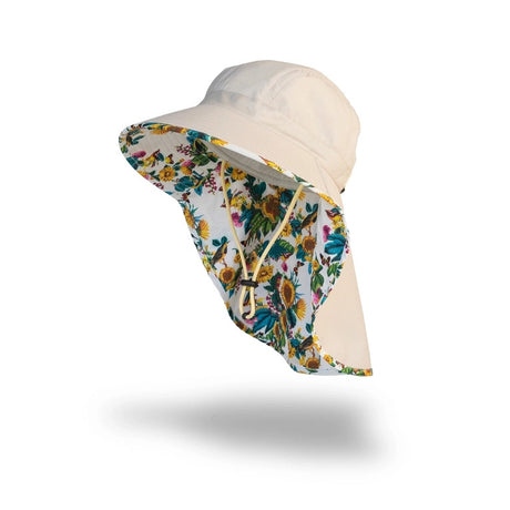 a floating cream colored hat that shows the shape of the brim, crown, and the back flap neck protection with a repeated flower pattern on the inside of the hat and neck flap