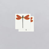 two sets of amber damselfly temporary tattoos showing the tattoo layout on the sheets