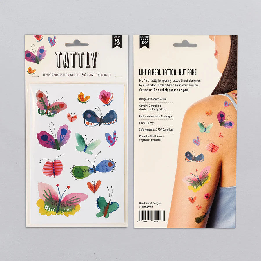 side by side placement of the front and back of the butterfly frenzy tattoo sheet packaging