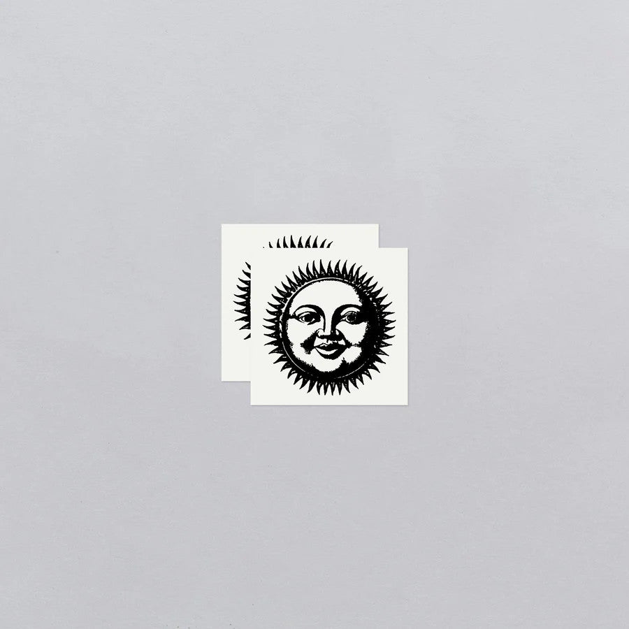 two vintage sun illustration temporary tattoos