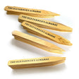 A set of wooden garden plant markers with 'The Old Farmer's Almanac' printed on them.