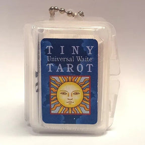 a keychain sized tarot card deck with sun image as the front facing card in a plastic case with a ball chain looped through the top